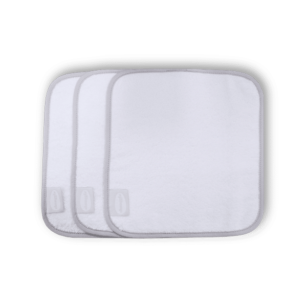 Shnuggle Bamboo Wash Cloths in white, featuring a soft texture and rounded corners, packaged in a set of three.