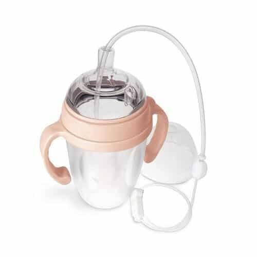 Haakaa Supplemental Nursing System bundle with clear bottle, pink handles, and feeding tube for convenient breastfeeding