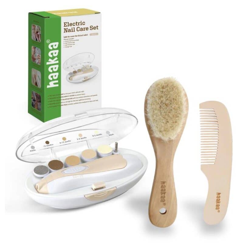 Haakaa Baby Care Bundle featuring an electric nail care set, wooden brush, and comb in a clear case.