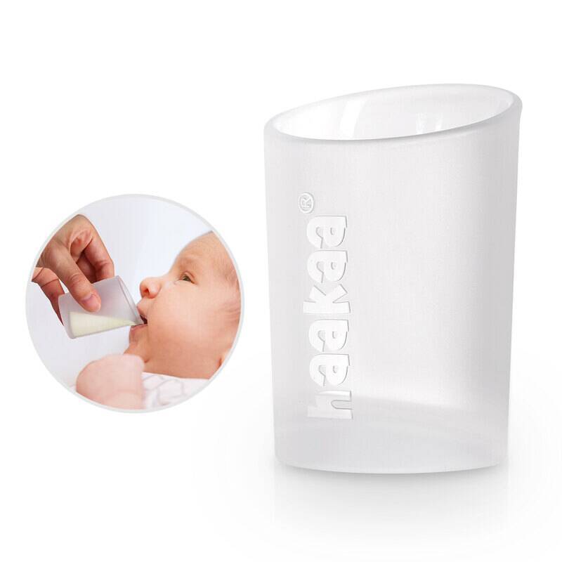 Haakaa Silicone Colostrum Collector Feeding Pack in clear, designed for easy feeding with a baby. Pre-sterilised for safety.
