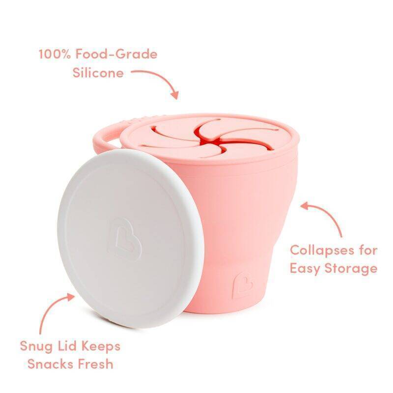 Munchkin C’est Silicon Snack Catcher in pink with a snug lid, collapsible design for easy storage, and food-grade silicone.