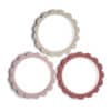 Mushie Flower Bracelets 3P in soft pink, beige, and red with a scalloped edge design.