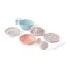 Pigeon Home Baby Food Maker accessories in pastel colors, including a strainer, bowl, juicer, and masher.