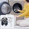 Momcozy Mtwml Portable High Chair being washed in a washing machine, showcasing its easy-clean design and detachable parts.
