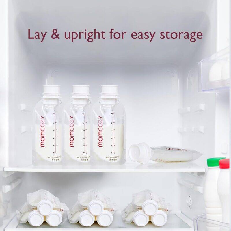 Momcozy Disposable Baby Bottle Kit stored in a refrigerator, featuring clear bottles and milk storage bags for easy access.