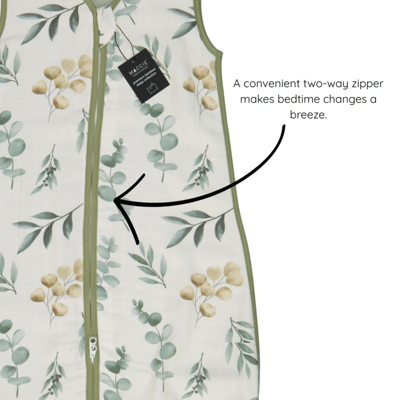 Maccie Summer Sleep Sac for 3-9 months in beige with green leaves, featuring a convenient two-way zipper for easy changes.