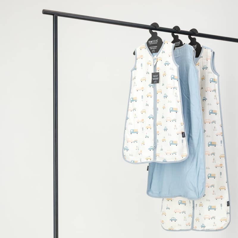 Maccie Summer Sleep Sac for 3-9 months in beep beep + blue, featuring playful cars and animals on a light background.