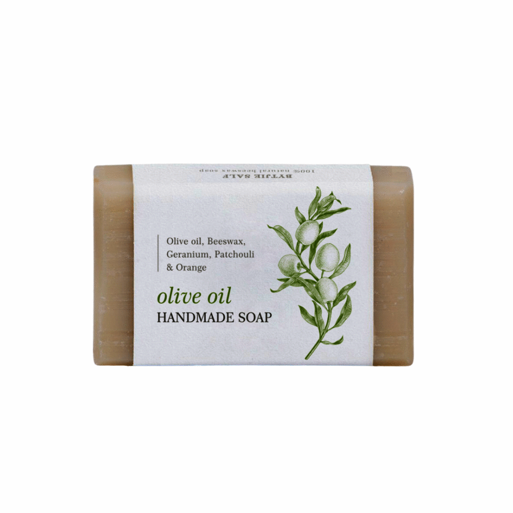 Bytjie Salf Olive Oil Handmade Soap with geranium and patchouli, featuring a natural beige color and botanical label.