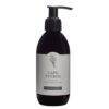 Bytjie Salf Cape Fynbos Lotion in a dark pump bottle, featuring a label with botanical design and text.