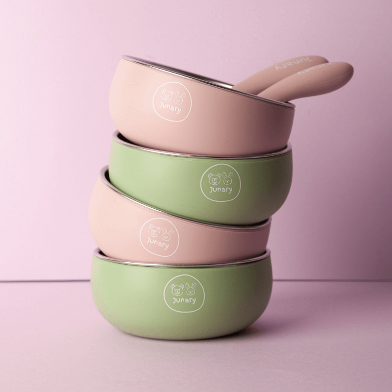 Junary Little Bites Bowl Duo in pink and green, featuring a sleek design with the Junary logo.
