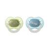 Tommee Tippee Night Glow Soother 0-6M 2Pk in green and blue, featuring star designs and easy-grip handles.