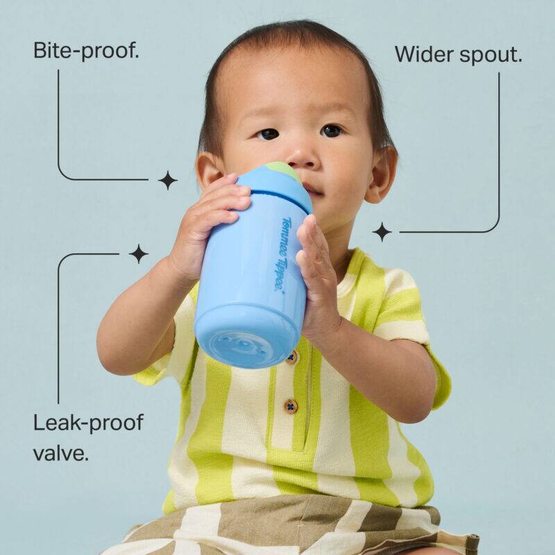 Tommee Tippee Toddler Sipper 390ml in blue, featuring a wider spout and leak-proof valve, held by a toddler.