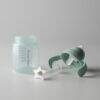 Tommee Tippee Trainer Straw 240ml in neutral color with a detachable straw and star-shaped handles for easy grip.