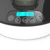Baby Brezza Bottle + Breastmilk Warmer with digital display and control buttons, showcasing the quick warm feature.