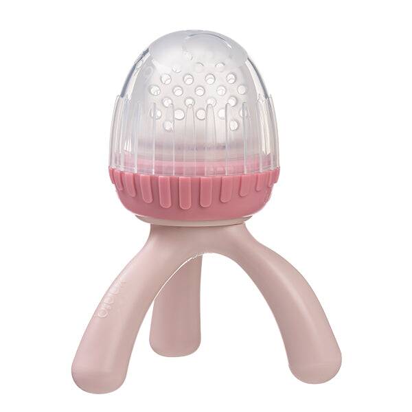 b.box Silicone Fresh Food Feeder in blush with a clear top and pink base, designed for safe feeding of solids.