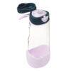 b.box 600mL sport spout bottle in emerald forest with a clear body and a purple base, featuring a flip-top lid.