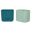 b.box silicone snack cup in forest green and light mint, featuring a soft, flexible design for easy gripping.