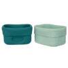 b.box silicone snack cup in forest green and mint, featuring a soft, flexible design for easy handling.