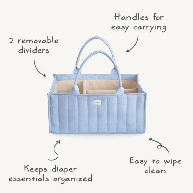 Mushie Diaper Caddy in Blue Flowers and Blush with two removable dividers and easy-to-carry handles.