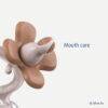 Difrax Crown Teething Ring in beige with a floral design, featuring a textured surface for soothing gums.