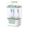 Momcozy 4 in 1 Compact Bottle Sterilizer and Dryer in white and green, featuring multiple bottle slots and a clear lid.