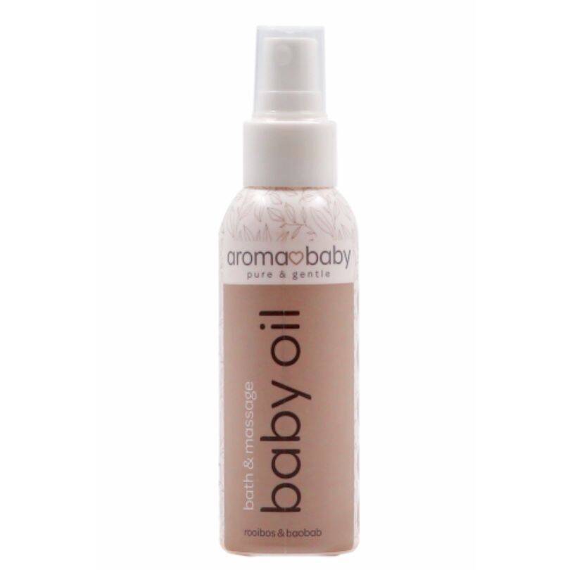 Aromababy baby oil in a spray bottle, featuring a soft pink label with white text, ideal for bath and massage.