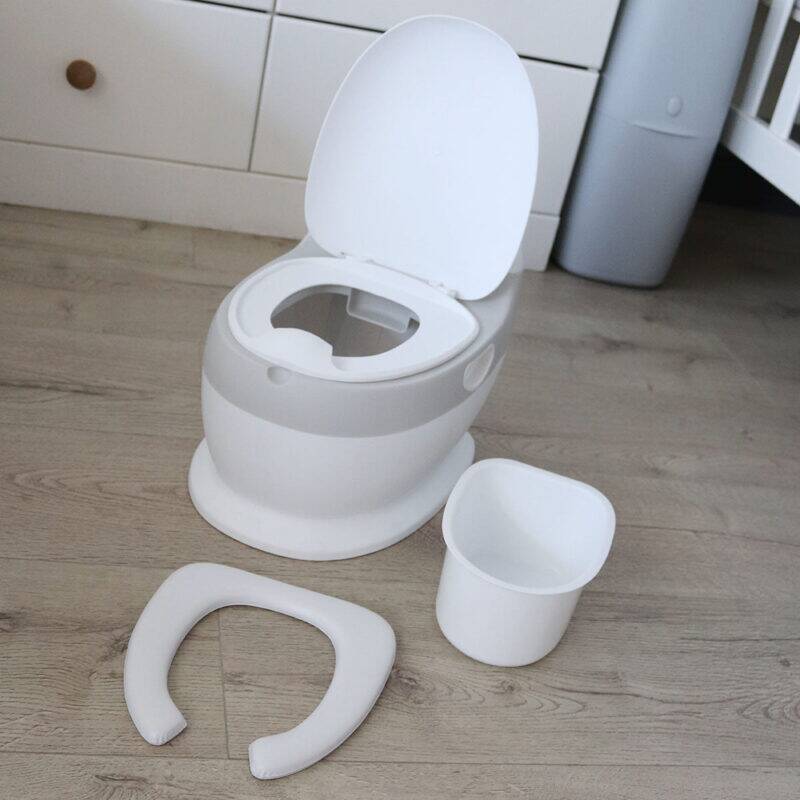 Snuggletime Comfort Toilet Seat Potty in white with removable inner bucket and soft padded seat for comfort.