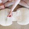 Snuggletime Bamboo Dual Support Preggy Wedge in cream, featuring a zippered cover for easy cleaning and adjustable support.