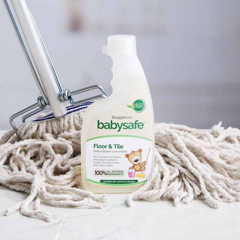 BabySafe Floor & Tile Deep Cleaner Concentrate 500ml with eco-friendly label, displayed next to a mop on a clean surface.