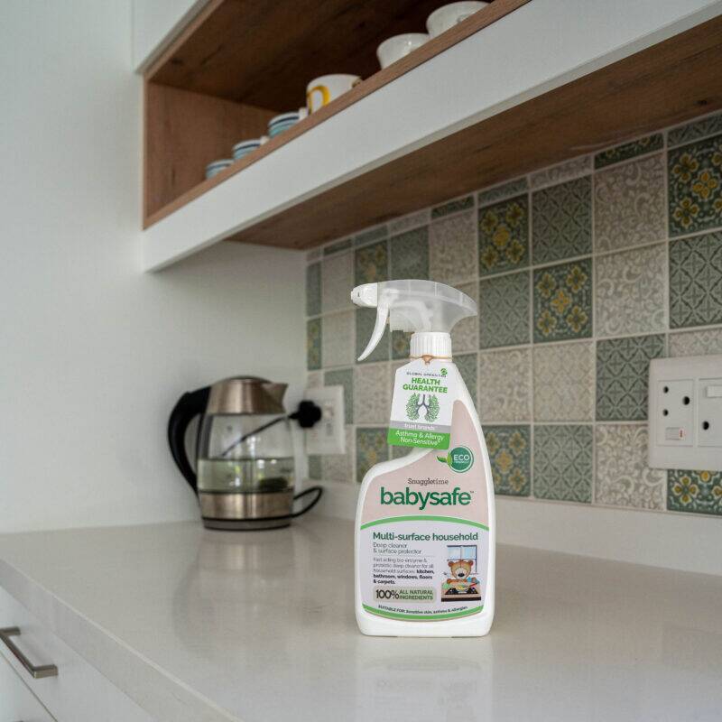 BabySafe Multi-Surface Household Deep Cleaner, 500ml, displayed on a kitchen counter with patterned tiles and a kettle in