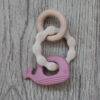 Back To Nature Teether Ring in blue and pink, featuring a whale design and textured surfaces for soothing gums.