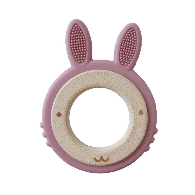 Back To Nature Teether Ring in pink with rabbit ears and a wooden center, designed for soothing teething babies.
