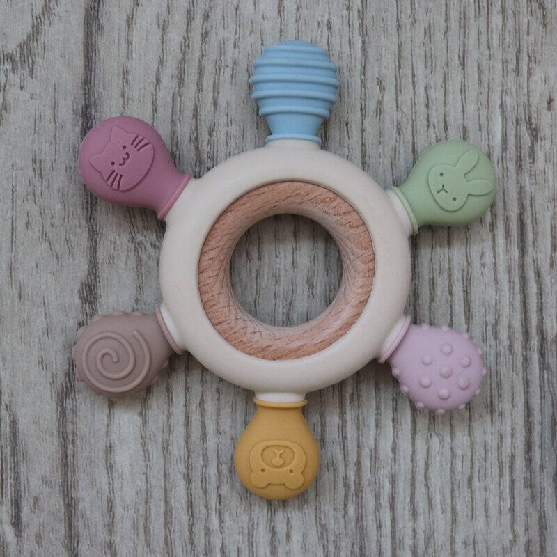 Back To Nature Silicone Chewable Teether with Wooden Ring, featuring colorful textured silicone ends and a natural wood