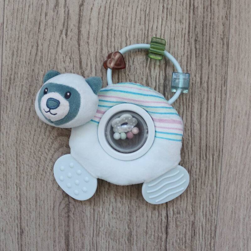 Back To Nature Teether & Spinning Rattle in blue and pink with a bear design and a spinning center filled with beads.