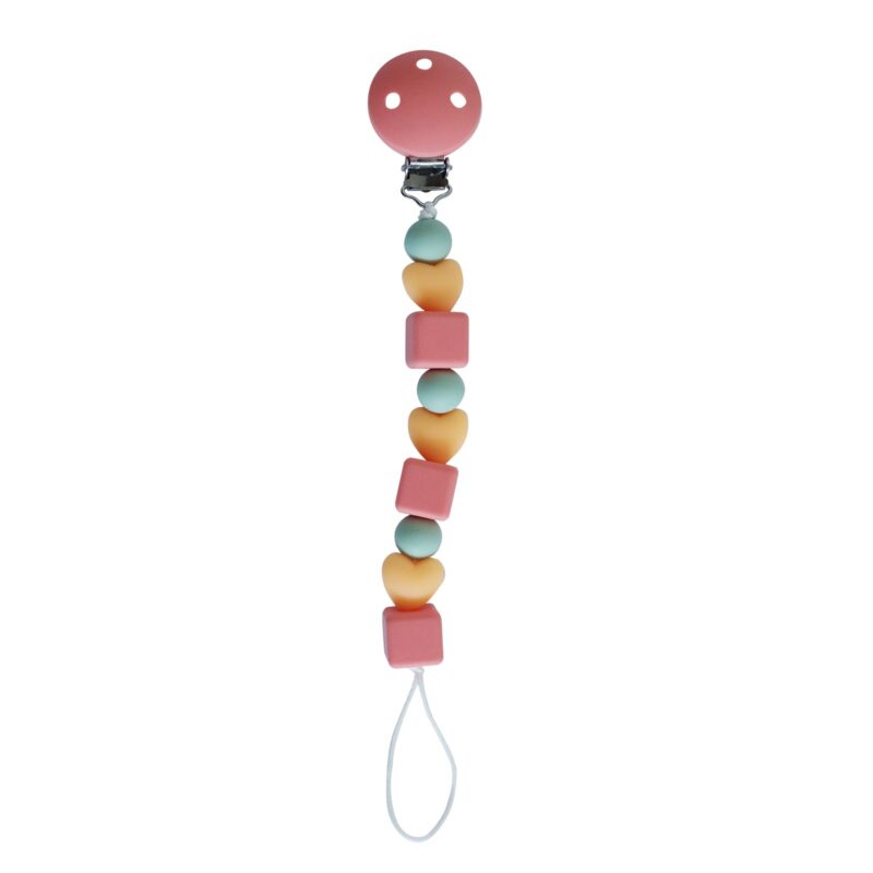 Back To Nature Silicone Pacifier Clip in pink with colorful cubes and hearts, designed to keep pacifiers secure.