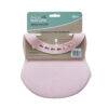 Back To Nature Silicone Bib in soft pink, designed for babies, featuring a catch-all pocket to prevent spills.