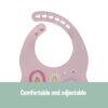 Back To Nature pink silicone bib featuring adjustable neck and colorful rainbow design for comfort during mealtime.