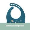 Blue Back To Nature Silicone Bib featuring a dinosaur design, highlighting its comfortable and adjustable fit.