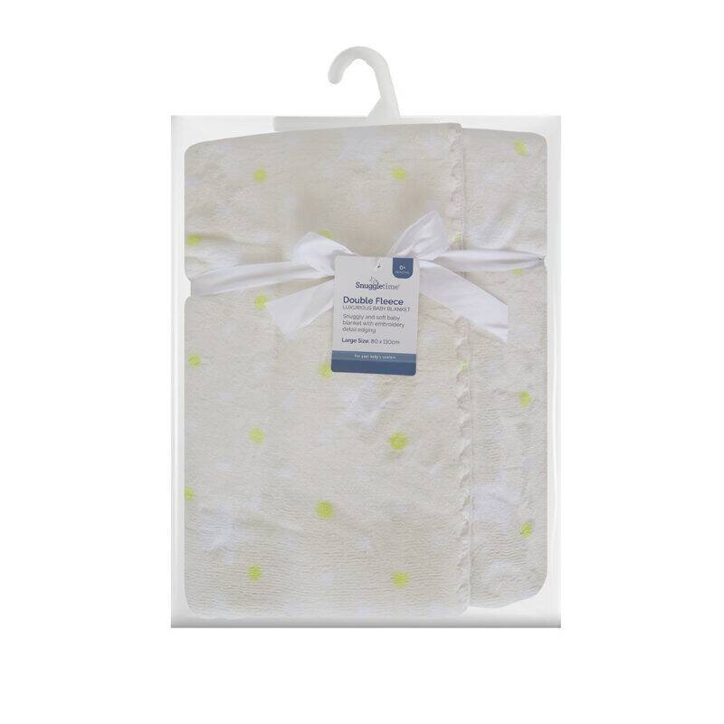 Snuggletime Double Fleece Baby Blanket in cream with yellow polka dots, tied with a ribbon for a cozy presentation.