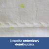 Snuggletime Double Fleece Baby Blanket in cream with delicate embroidery detail along the edge.