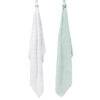 Infancie Bamboo Muslin Blankets 3Pk featuring a white blanket with a subtle pattern and a soft green blanket hanging.