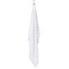 Infancie Bamboo Muslin Blanket in white with green leaf patterns, hanging to showcase its lightweight and breathable fabric.