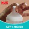 Nuk Perfect Match 120ml glass bottle in rainbow style, featuring a soft and flexible nipple for easy feeding.