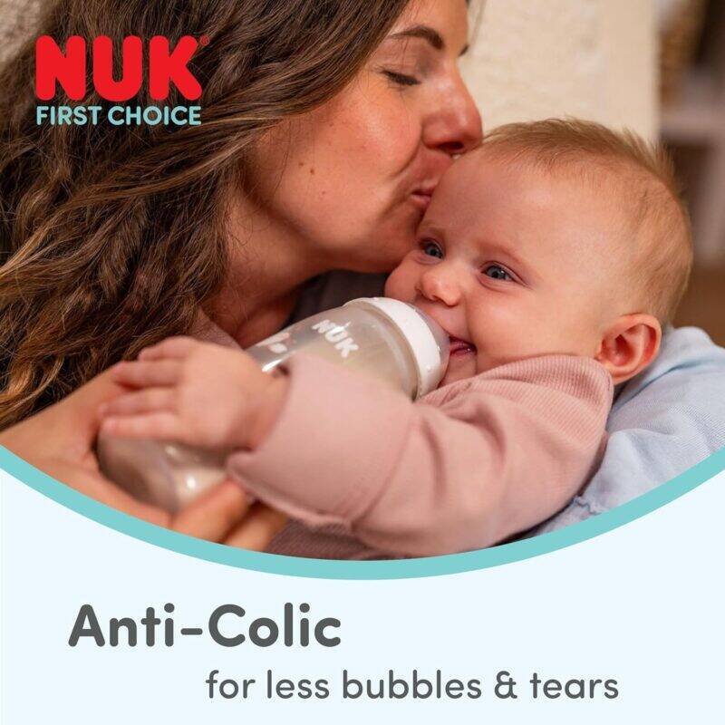 Nuk First Choice 150ml bottle in Koala style, held by a mother with her smiling baby, promoting anti-colic features.