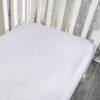 Snuggletime Bamboopaedic Healthtex fitted sheet in white, designed for large and standard camp cots. Soft and breathable