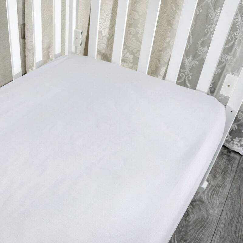 Snuggletime Bamboopaedic Healthtex fitted sheet in white, designed for large and standard camp cots. Soft and breathable