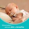 Nuk Perfect Match Air Mini Soother in Bear style, designed for 0-2 months, shown with a sleeping baby for comfort context.