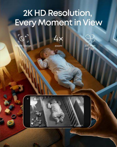 Eufy C10 2K Wireless Smart Baby Monitor displaying a baby in a crib, viewed on a smartphone with night vision feature.