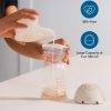 Eufy Milk Container for Breast Pump E10, BPA-free, showing a hand pouring milk into a 5 oz container on a table.