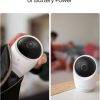 Eufy E21 Wireless 4K Portable Smart Baby Monitor held in hand, showcasing its compact design for easy travel and use.